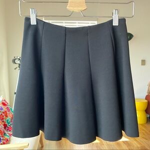 TOPSHOP black mini flare out skirt - size 4 Petite